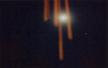 This is a shot of the wind chimes I made with the full moon and the moving stars in the background