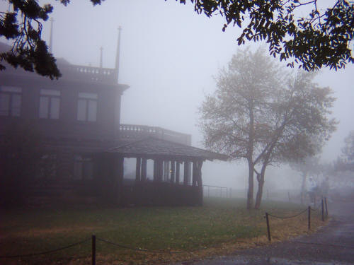 An foggy view of a building at the Grand Canyon